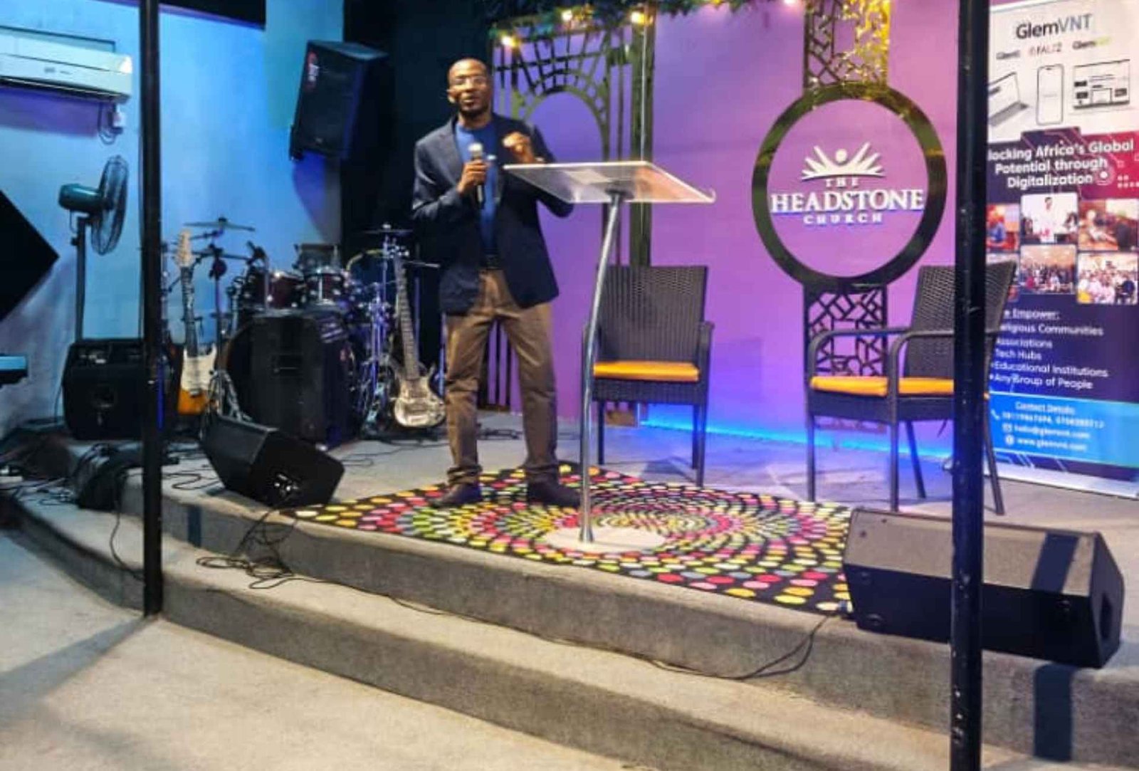 Anzolo at friends connect leading the africa awakening standing far distance
